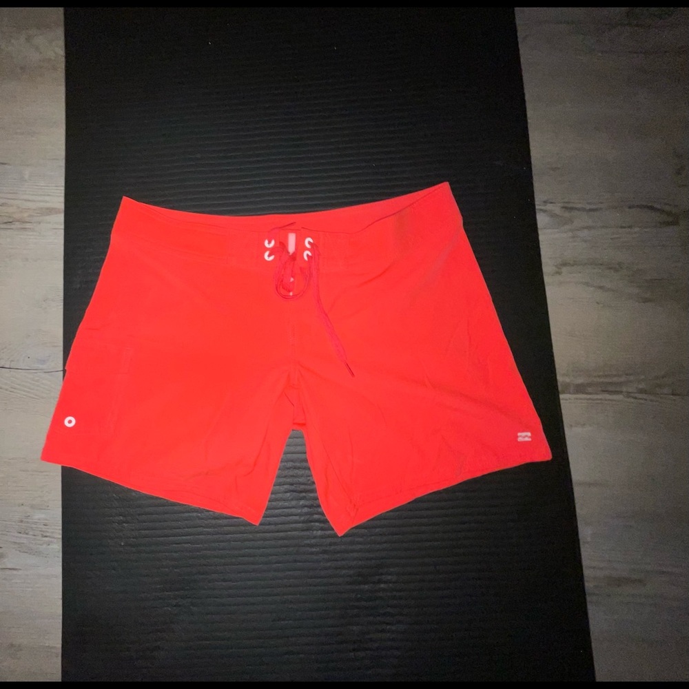 Billabong orange board shorts size 7